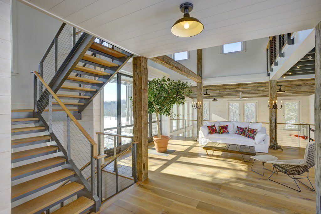 Ithaca style staircase and railing in open activity barn.